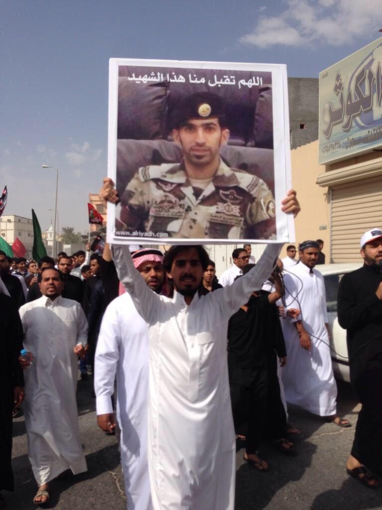 حادثة الدالوة: مشيعون يرفعون صور الشهداء