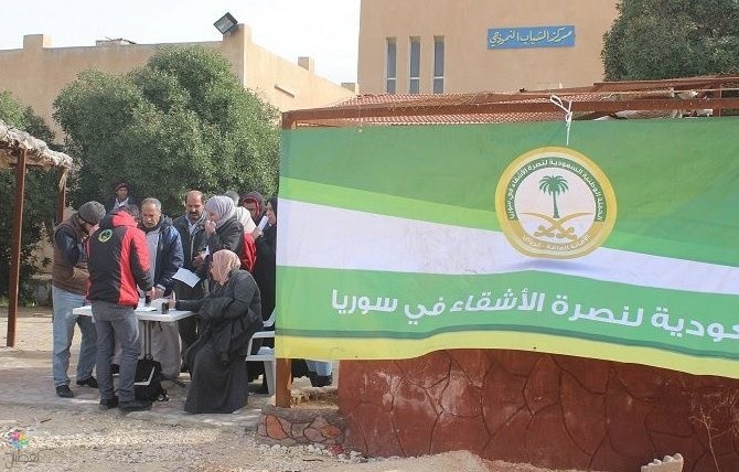 المملكة توزع قطع شتوية على السوريين