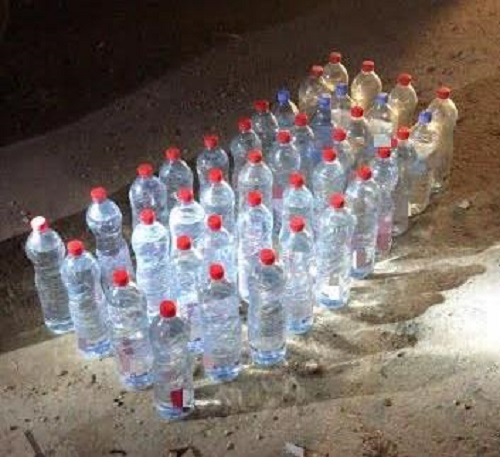 بالصور.. ضبط مصنع خمور متكامل جنوب الرياض
